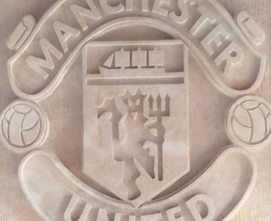 Jual Seni Ukir Batu Alam Paras Jogja Motif Logo Manchester United